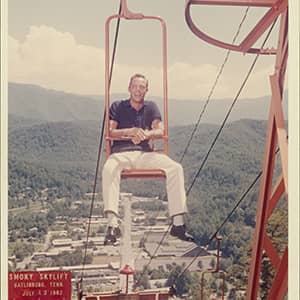 General Manager Clayton Watson riding the single chair SkyLift.