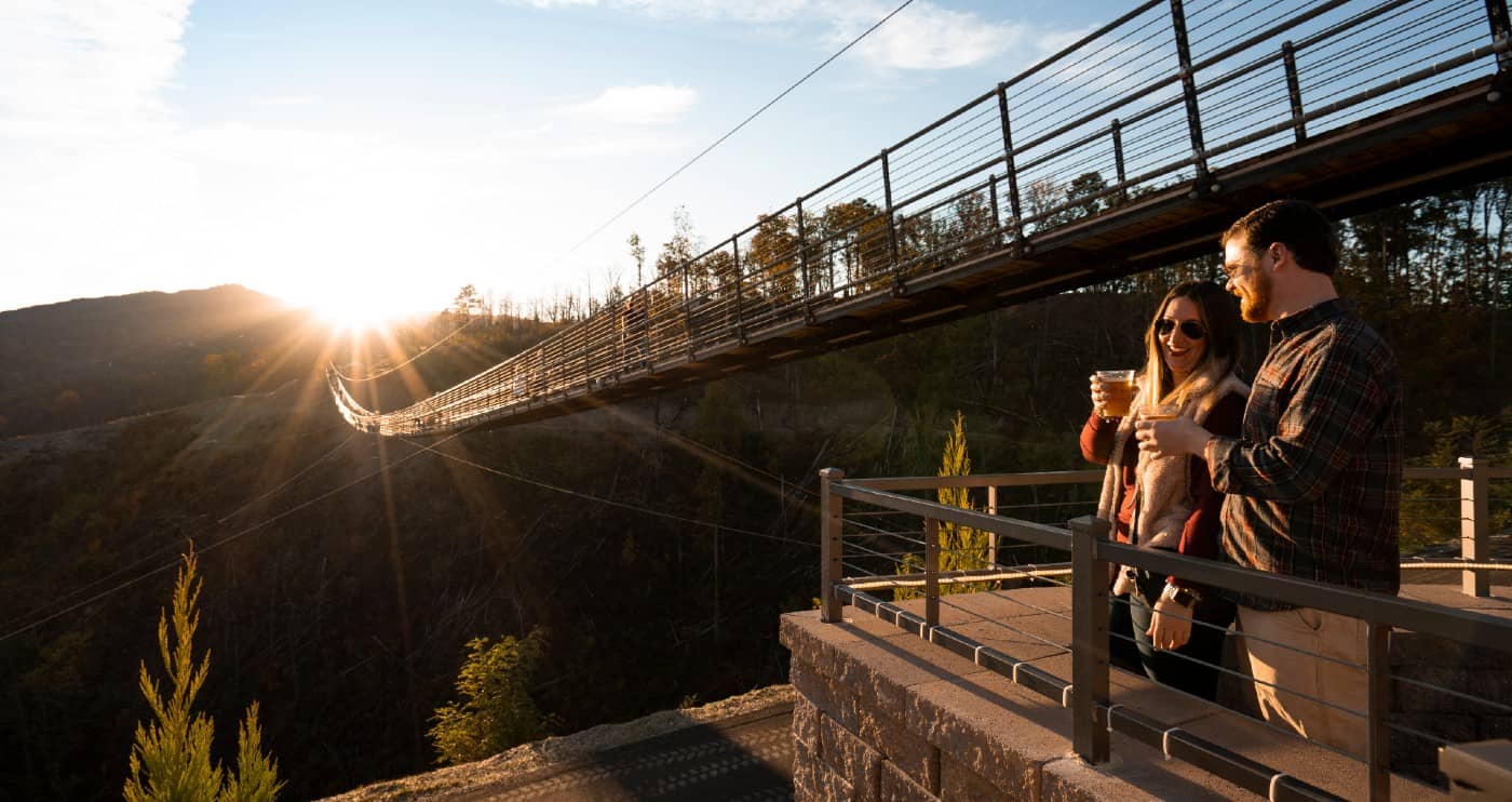 Two guests enjoying drinks at the Gatlinburg SkyBridge.